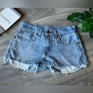 Levi’s 511 upcycled raw hem cutoff denim shorts. Size 29